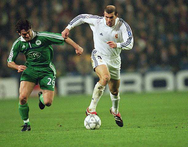 Dec 2001 Zinedine Zidane Of Real Madrid Takes On Giorgios Karagounis Picture Id1573471 800